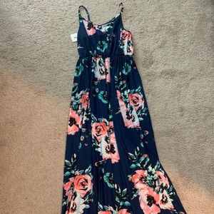 Dress brand new with tag on. Size medium.